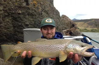 huge brown trout montana angler fly fishing guided trip